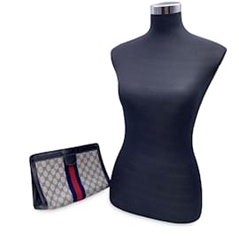 Gucci-Listras de embreagem de bolsa cosmética de lona azul vintage com monograma-Azul