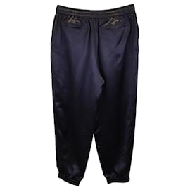 Saint Laurent-Saint Laurent Pantalon de survêtement à taille élastique avec cordon de serrage et pompons en soie noire-Noir