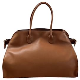 The row Bolsas Camelo