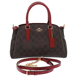 Coach Brown Signature Coated Canvas and Leather Mini Ruby Crossbody Bag  Coach | The Luxury Closet