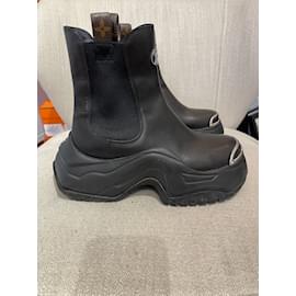 LOUIS VUITTON Ankle boots T.EU 37 leather Black ref.998440 - Joli