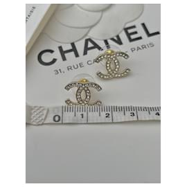 Chanel-pendientes CC-Dorado