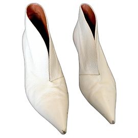 Céline Vintage Creme glossy leather boots with an opening in front and kitten heel Eggshell