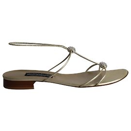 Stuart Weitzman Crystal Embellished Flat Sandals in Gold Leather Golden