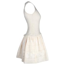 Maje-Ärmelloses Maje-Minikleid mit ausgestelltem Rock aus cremefarbenem Polyester-Weiß,Roh