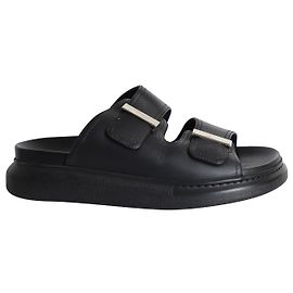Gefütterte Schnallen-Slides von Alexander McQueen aus schwarzem Leder Schwarz