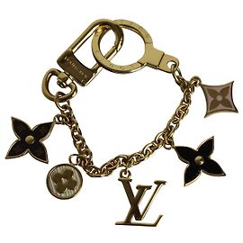 Charme de bolsa Louis Vuitton Fleur de Monogram em metal dourado Dourado
