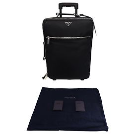 Valigia trolley Prada Carry On in nylon nero e pelle Saffiano Nero