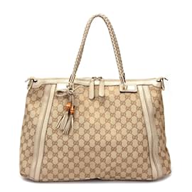 Gucci-Cabas Bella en toile GG-Doré