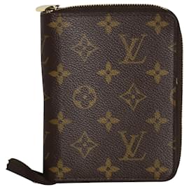 Louis Vuitton-Portafoglio porta passaporto con cerniera Louis Vuitton Monogram in tela rivestita marrone-Marrone