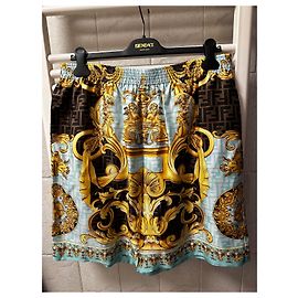 Versace Short en soie Fendace Doré