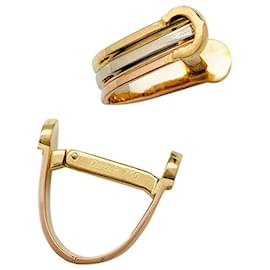 Cartier-Cartier "Mini Ressort CC" three-gold cufflinks.-Other
