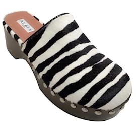 Alaïa Alaia White / Black Zebra Pony Clogs Black