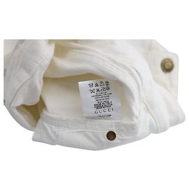 Saia jeans Gucci com pingente de âncora dourado em algodão branco Branco Cru