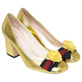 Gucci-Zapatos de tacón con diseño de rosas y lazo en dorado metalizado-Dorado