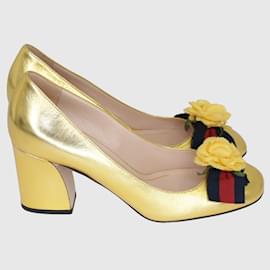 Gucci-Pumps mit Webschleife und Rosen in Metallic-Gold-Golden