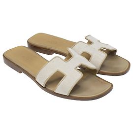 Hermès Beigefarbene Canvas-Oran-Sandale Beige
