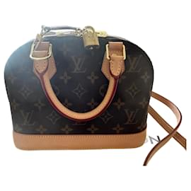 Borsa Louis Vuitton Roxbury PM in pelle verniciata e finiture in