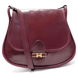 Hermès-VINTAGE SAC A MAIN HERMES CLEO GLIKA 1981 EN CUIR BOX ROUGE BANDOULIERE HAND BAG-Rouge