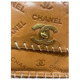Vintage CHANEL tan brown allover logo embossed leather jumbo