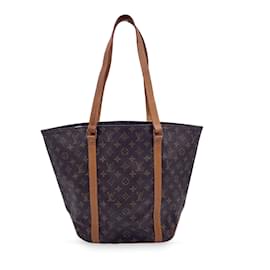 Louis Vuitton-Bolso de compras tipo saco de lona con monograma vintage-Castaño