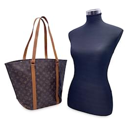 Louis Vuitton-Bolso de compras tipo saco de lona con monograma vintage-Castaño