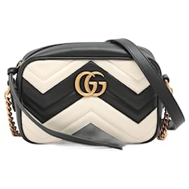 Gucci-Borsa a tracolla GG Marmont Mini con catena in pelle nera × bianca-Multicolore