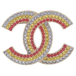 NUOVA SPILLA CHANEL LOGO CC IN STRASS MULTICOLORE NUOVA SPILLA MULTICOLORE D'oro