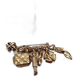 Broche Chanel 6 breloques métal doré Doré