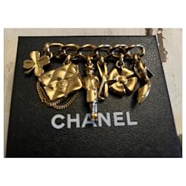 Chanel-Alfinetes e broches-Dourado