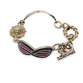 Gucci-Bracelet chaîne à bascule tête de lion en métal doré émail rouge vert-Doré