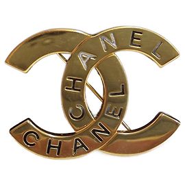 Broche Chanel CC métal doré Doré