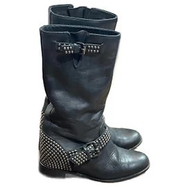 Botas CHRISTIAN LOUBOUTIN T.EU 35.5 Couro Preto