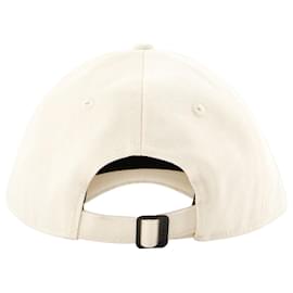 JW Anderson-The Baseball Cap by J.W. Anderson is a contemporary take on a classic accessory, infusing casual sportswear with a touch of avant-garde design. To complement its unique and stylish aesthetic, pair it with outfits that blend casual comfort with a modern, fashion-forward edge. Consider teaming it with an oversized graphic tee and wide-leg trousers for a relaxed yet trendy urban look, or a minimalist, structured dress for a contrast that plays up the cap's playful yet sophisticated vibe. These choices harmonize with the cap's blend of everyday practicality and J.W. Anderson's signature artistic flair, creating a cohesive and chic ensemble. Ideal for casual outings, creative workspaces, or when you want to add a trendy twist to your day-to-day style, this pairing underscores the Baseball Cap's ability to elevate a simple outfit into a statement of contemporary fashion.-Beige