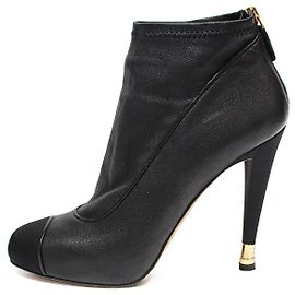 Botas Chanel de couro preto com salto CC dourado Preto