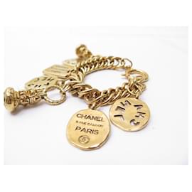 Chanel-ENCANTOS DE PULSERA CHANEL VINTAGE ENCANTOS 1990'S BRAZALETE DE METAL ORO-Dorado