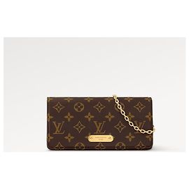 Louis Vuitton Cartera LV con cadena Lily Castaño