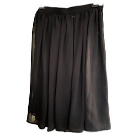 Falda Yves Saint Laurent de seda negra Talla 38 Negro