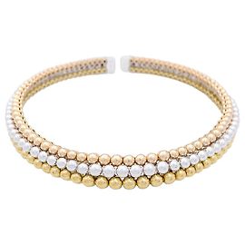 Boucheron necklace, “Grape Seeds”, three golds. Other