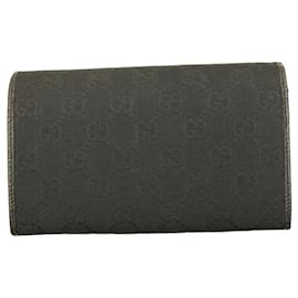 Gucci-Borsa a portafoglio bifold con logo Gucci in tela nera con finiture in pelle-Nero