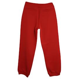 Louis Vuitton-Pantaloni sportivi con monogramma Louis Vuitton in poliestere rosso-Rosso