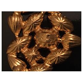 Yves Saint Laurent-Cuello redondo-Dorado