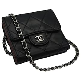 Chanel-Chanel-Geldbörse mit Kette. Zeitloses schwarzes Leder, gefütterte Öffnung, CC, diagonaler, JAHRGANG-Schwarz