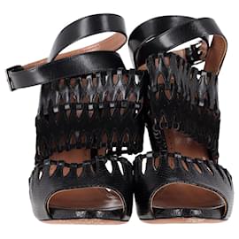 Alaïa-AlaÏa Cut-Out-Sandalen mit Knöchelriemen aus schwarzem Leder-Schwarz
