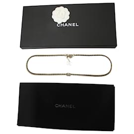 Chanel-Cintura Chanel con catena con logo intrecciato in metallo dorato-D'oro