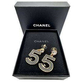 Boucles d'oreilles Chanel Numéro 5 en strass et métal doré Noir
