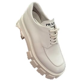 Scarpe stringate Prada Moonlith in pelle spazzolata Bianco