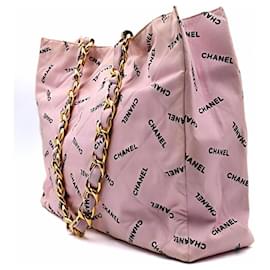 Chanel-Bolso de hombro Chanel vintage de lona rosa con cadena-Rosa