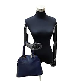 Yves Saint Laurent-Kuppelhandtasche aus Leder-Schwarz