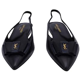 Saint Laurent-Zapatos planos con tira trasera y lazo Anais de Saint Laurent en cuero negro-Negro